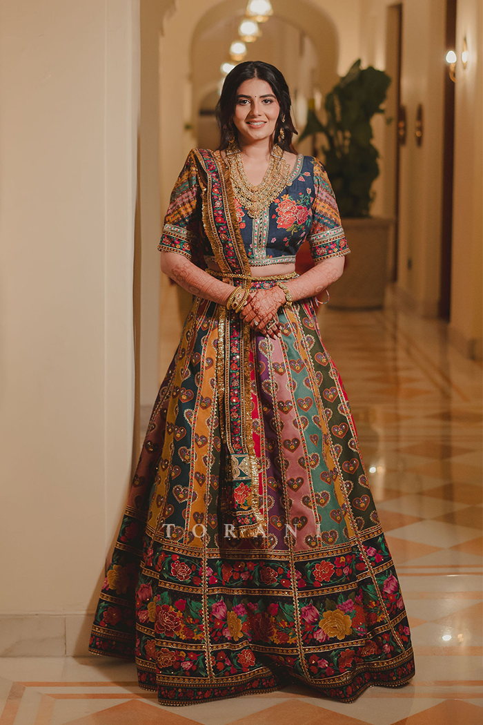 Jinali and Harshit in our Dil Rangrez Jiya Lehenga Set and Custom Dil Rang Ebi Bandi Set