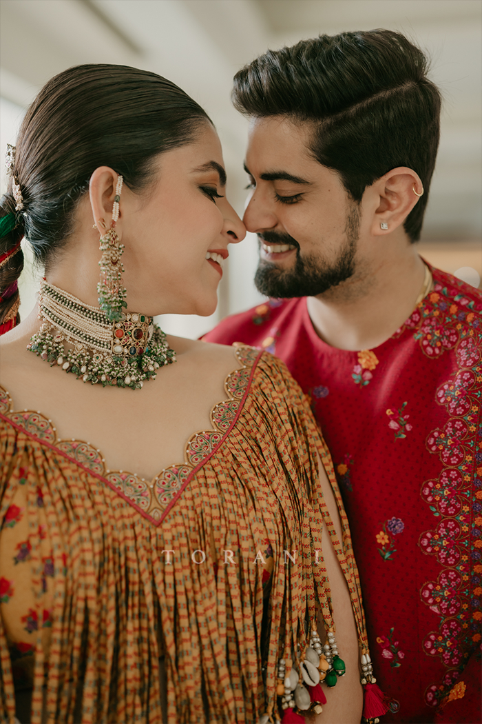 Aakrati and Vaibhav in our Dil Seher Bhavi Lehenga Set & Dil Surkh Mamun Kurta Set