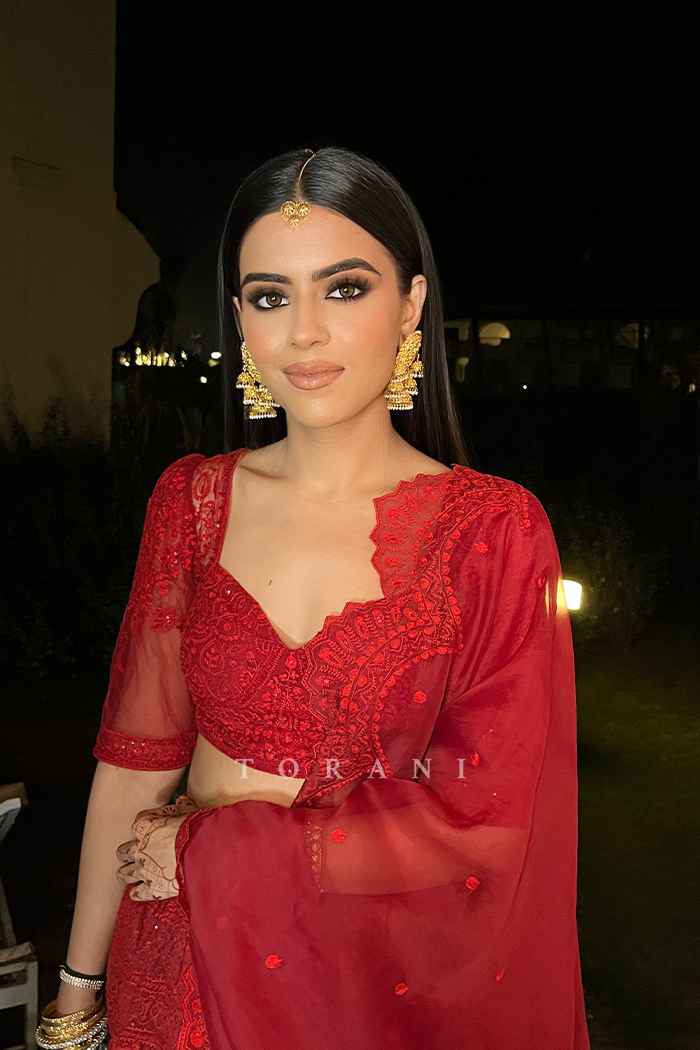 Simran Kukreja In Our Surkh Advaita Lehenga Set