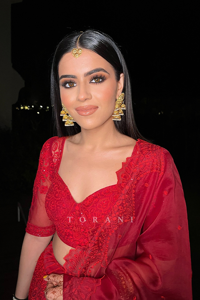 Simran Kukreja In Our Surkh Advaita Lehenga Set