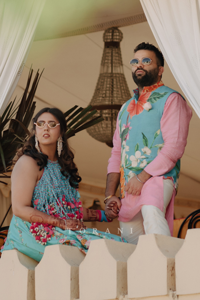 Rasalica and Abhishek in our Firoza Arshneer Lehenga Set & Custom Firoza Bandi