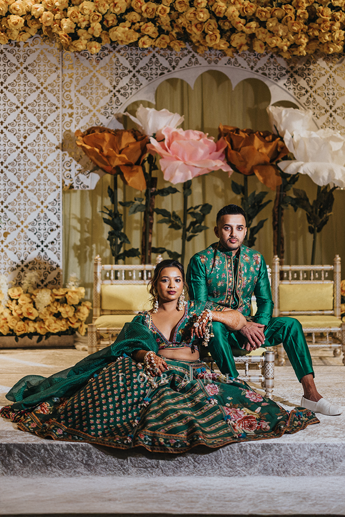Ashvi & Sunny in our Panna Waheeda Lehenga Set & Panna Gulfam Bandi Set