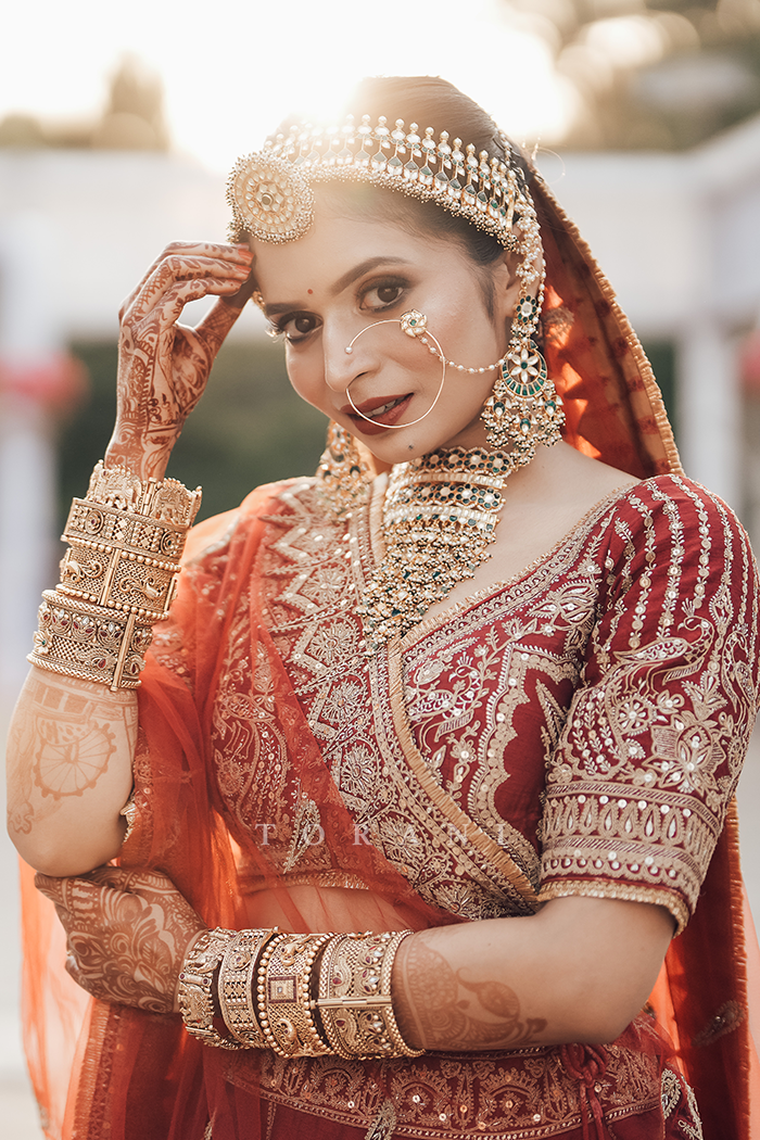 Sruthi with Her Partner in Our Custom Sindoori Suhani Lehenga Set & Mogra Gaurish Sherwani Set