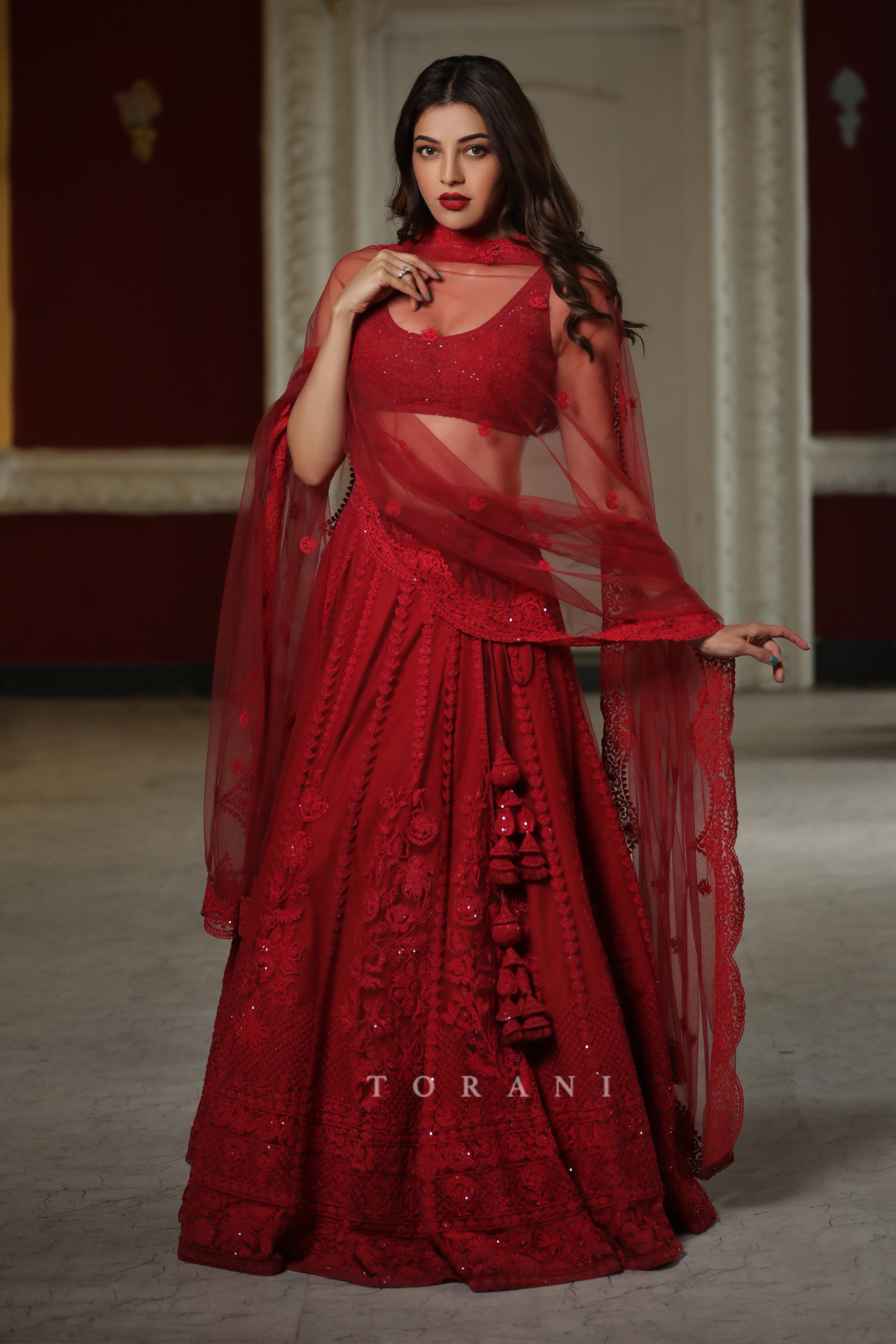 Kajal Aggarwal Kitchlu in our Surkh Mrinal Lehenga Set