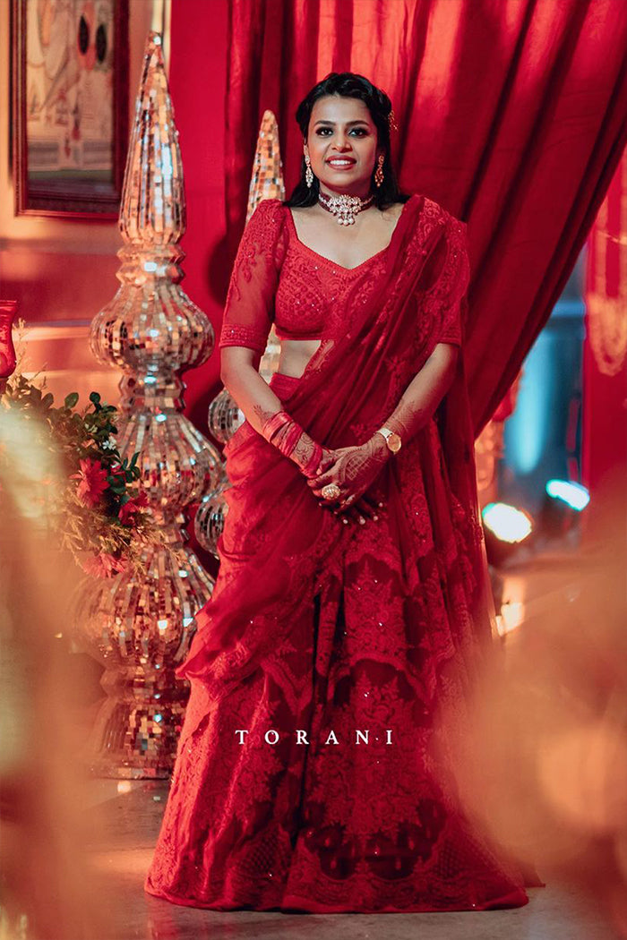 Palak Gupta in Surkh Meher Passa Lehenga Set by Torani
