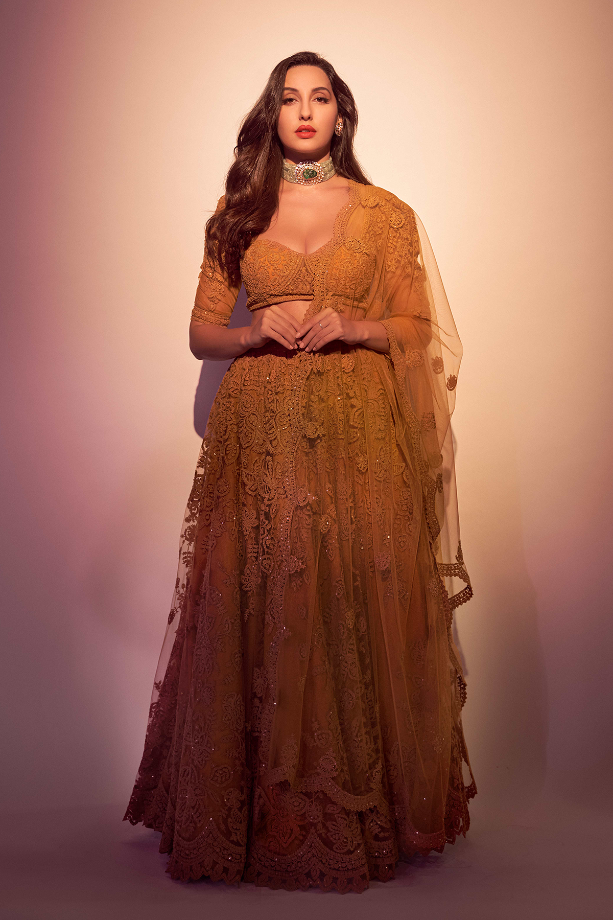 Featuring Nora Fatehi in Sunehra Hansini Lehenga Set from Torani