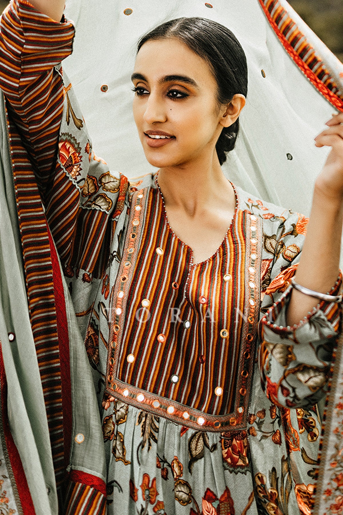 Harsukh in our Champa Sheesha Waraq Tara Kurta Set