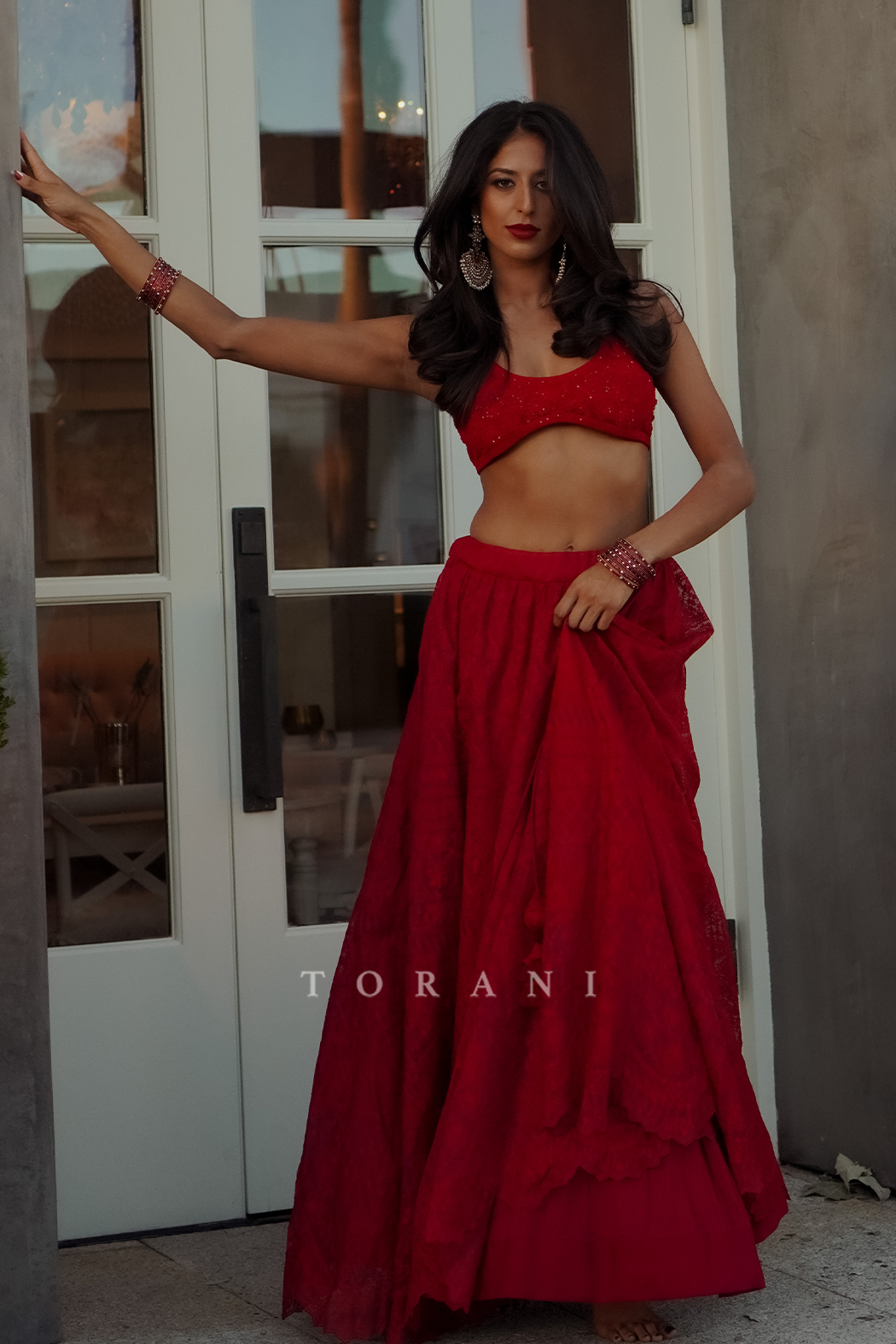 Nicole Mehta In Our Surkh Advaita Lehenga Set