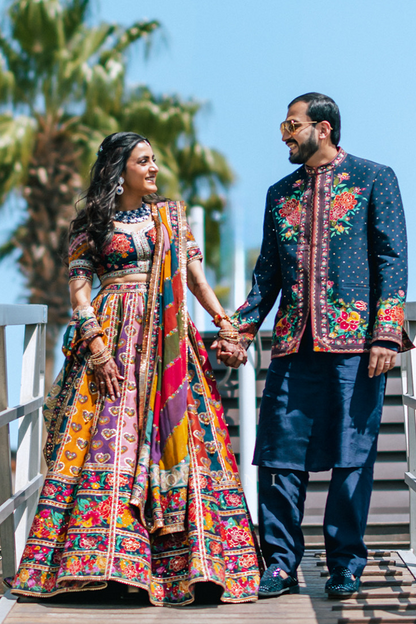 Radhika &amp; Abhishek in our Dil Rangrez Jiya Lehenga Set and Custom Dil Rang Arham Jacket Set