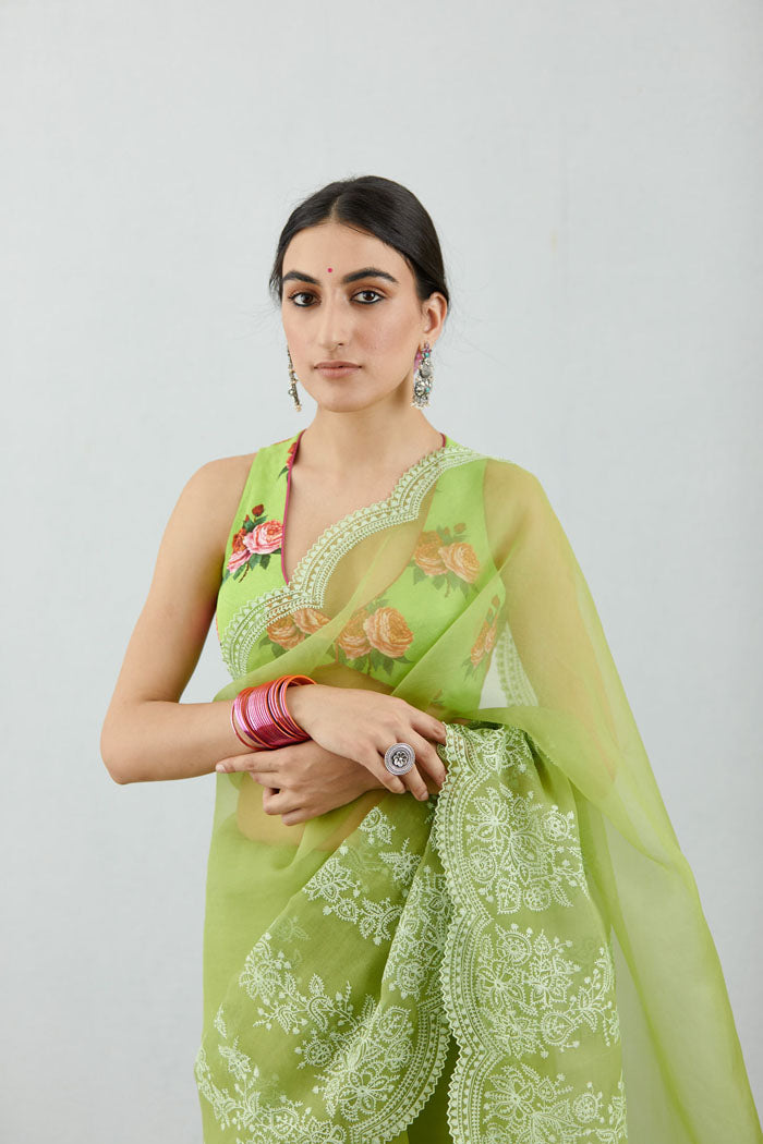 Green organza saree with Machine Embroidery