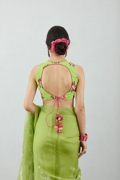 green sleeveless printed blouse by Torani