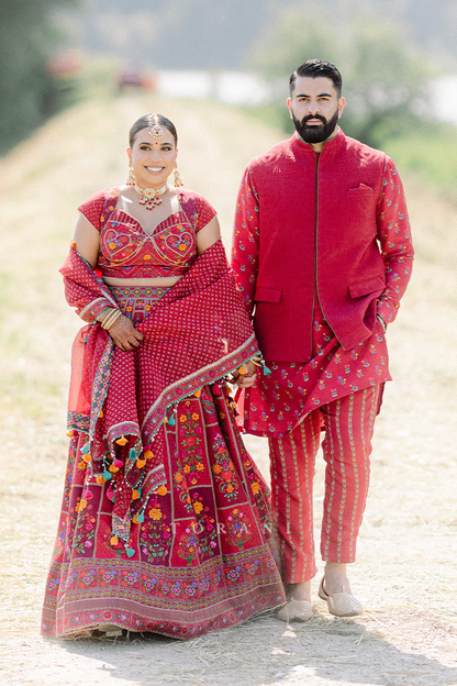 Jasmin and Nav in our Dil Surkh Avora Javeri Lehenga Set &amp; Dil Surkh Ramzi Bandi Set