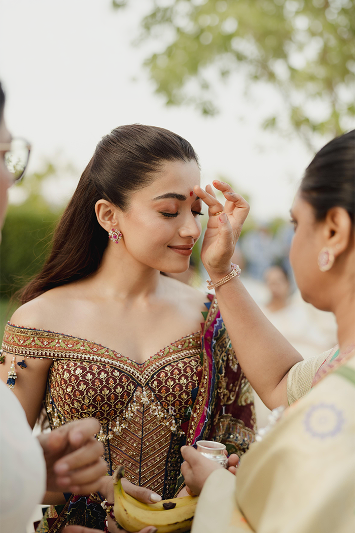 Rashmika and Vijay in our Custom Torani Set