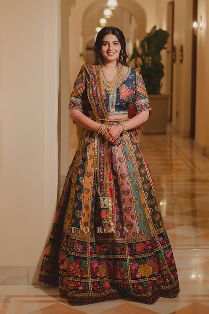 Jinali and Harshit in our Dil Rangrez Jiya Lehenga Set and Custom Dil Rang Ebi Bandi Set