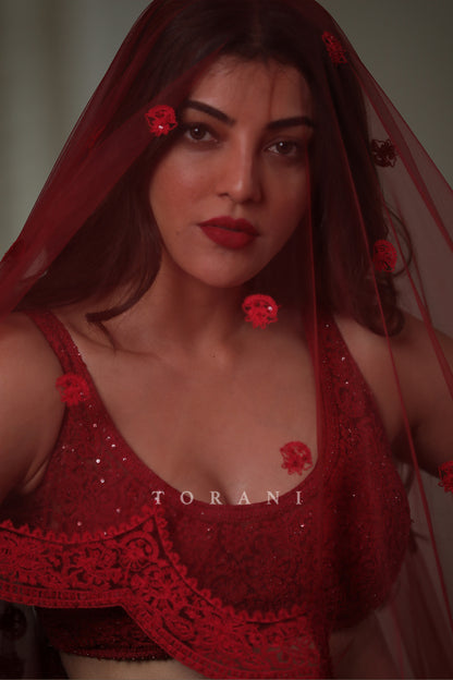 Kajal Aggarwal Kitchlu in our Surkh Mrinal Lehenga Set