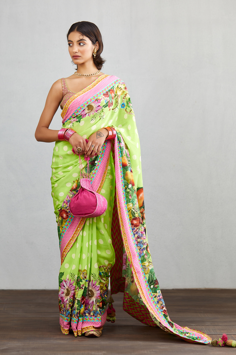 Green printed organza saree with hand touch