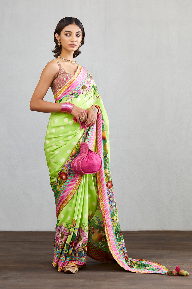 Torani's printed organza sarees with hand touch