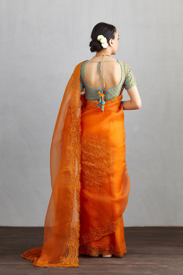 Printed designer orange blouse in chanderi