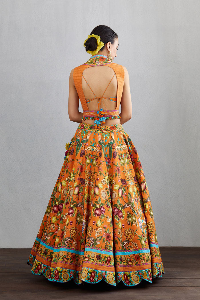 Orange printed chanderi lehenga set with backless choli