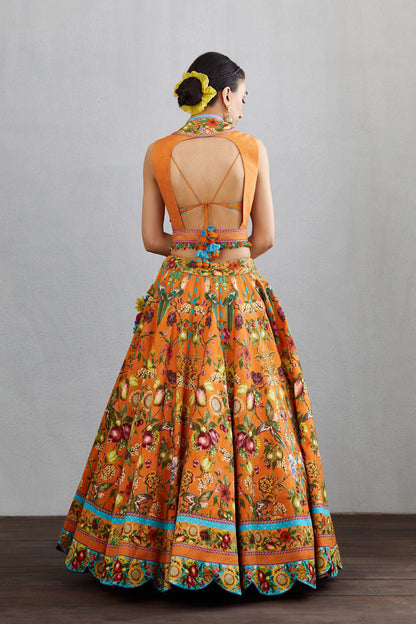 Orange printed chanderi lehenga set with backless choli