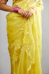 Yellow organza saree with hand embroidery