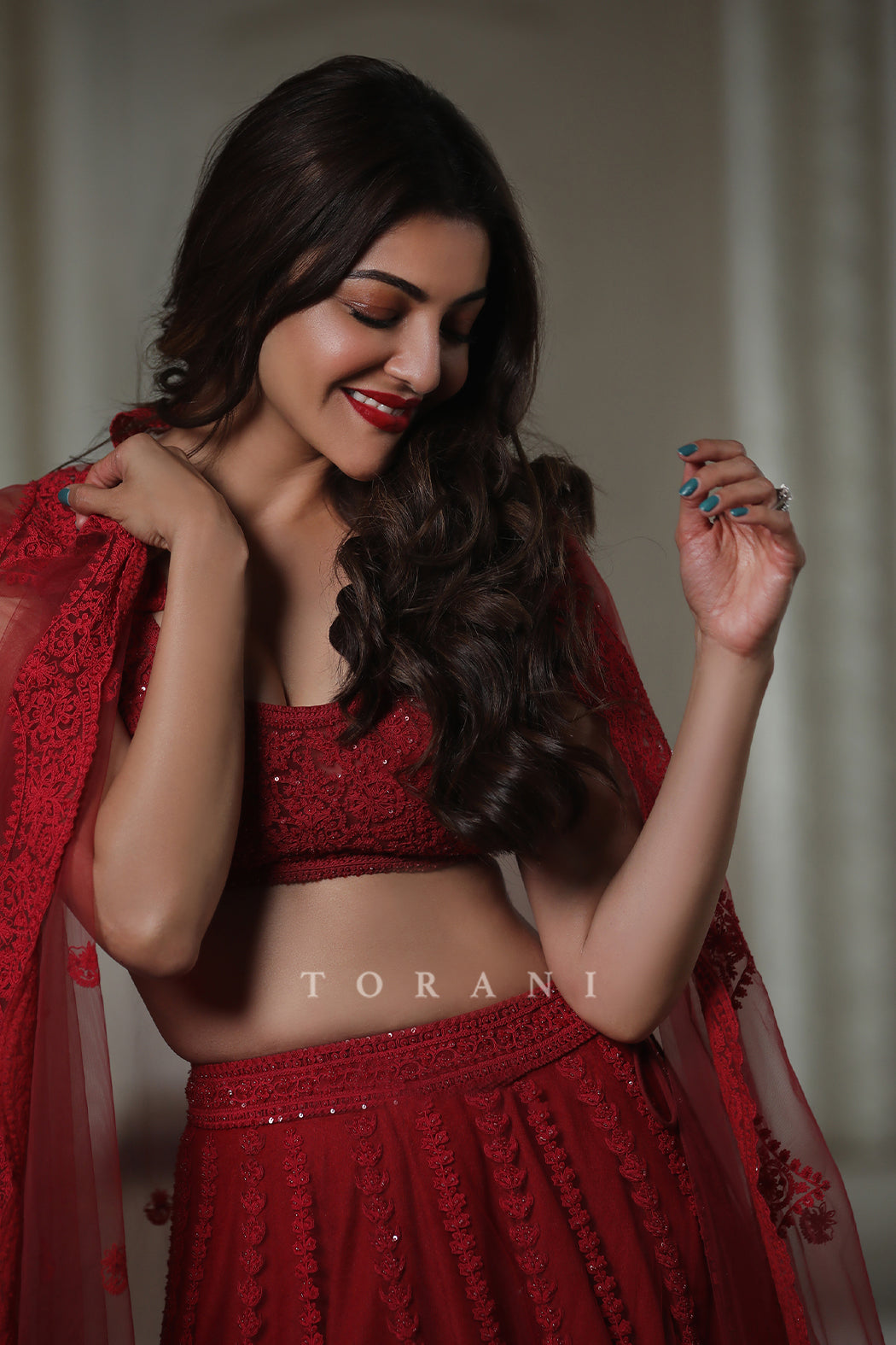 Kajal Aggarwal Kitchlu in our Surkh Mrinal Lehenga Set