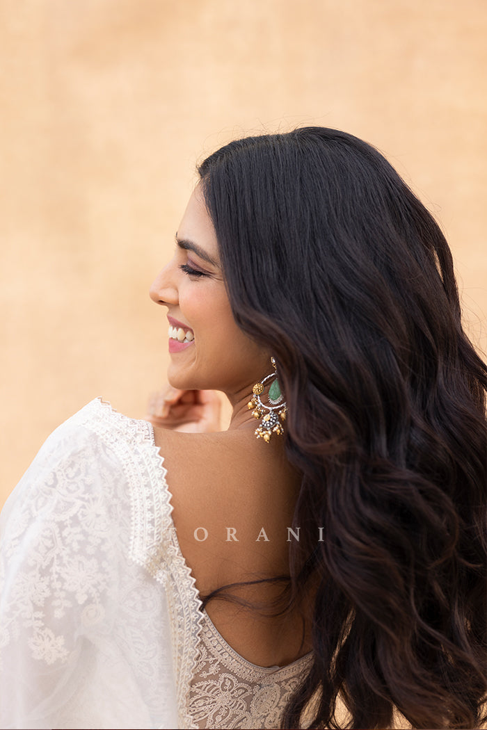 Malavika Mohanan In White Embroidered organza saree from Torani