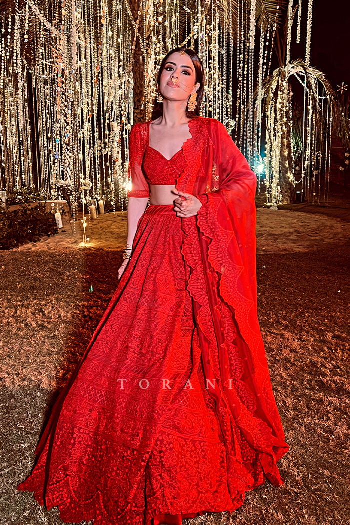 Simran Kukreja In Our Surkh Advaita Lehenga Set