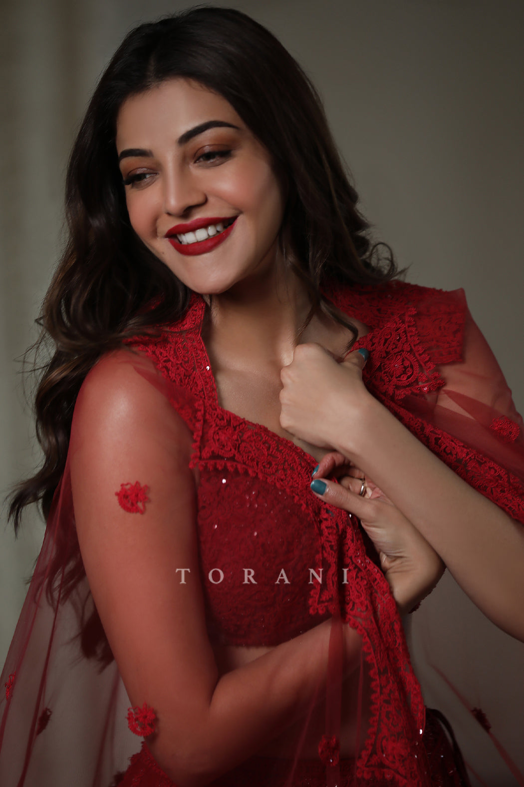 Kajal Aggarwal Kitchlu in our Surkh Mrinal Lehenga Set