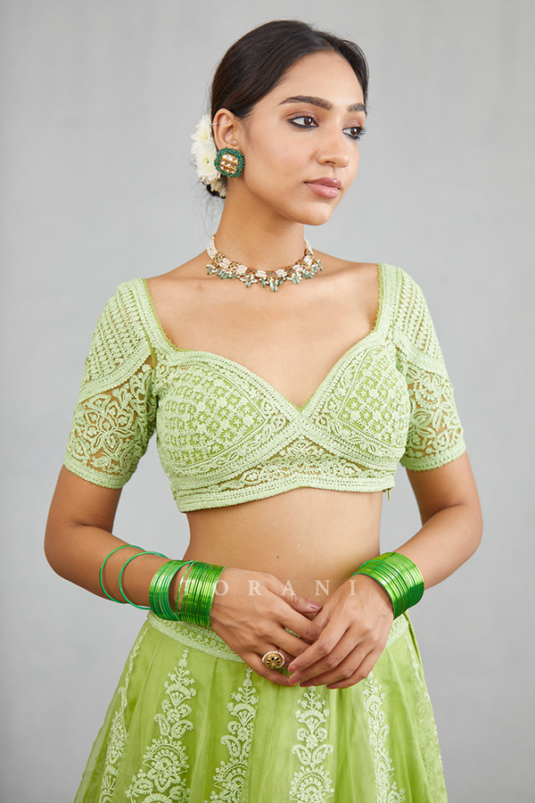 Green embroidered wide neck blouse for lehenga