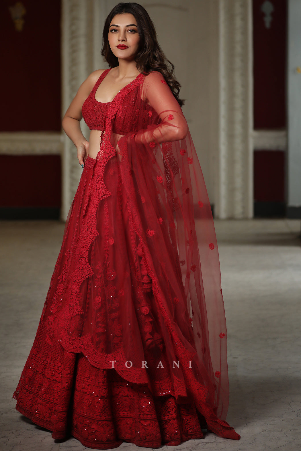 Kajal Aggarwal Kitchlu in our Surkh Mrinal Lehenga Set