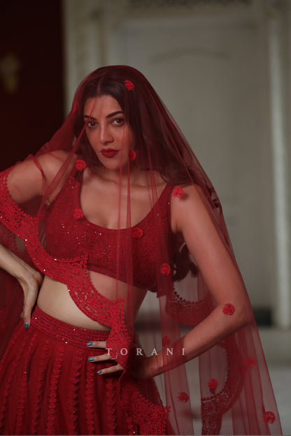 Kajal Aggarwal Kitchlu in our Surkh Mrinal Lehenga Set