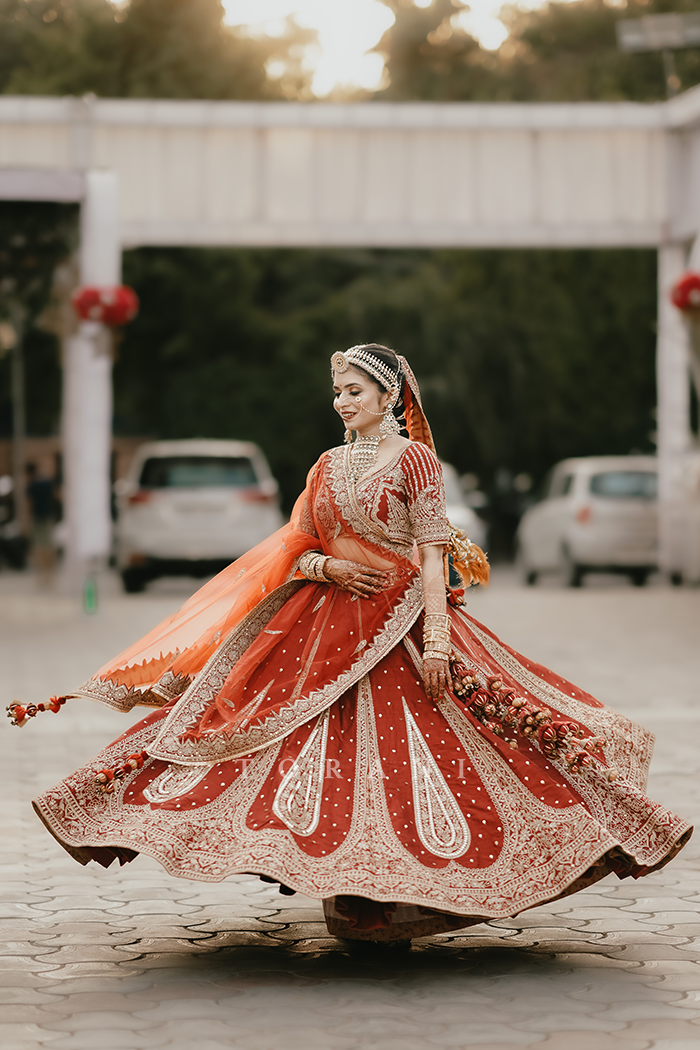 Sruthi with Her Partner in Our Custom Sindoori Suhani Lehenga Set &amp; Mogra Gaurish Sherwani Set