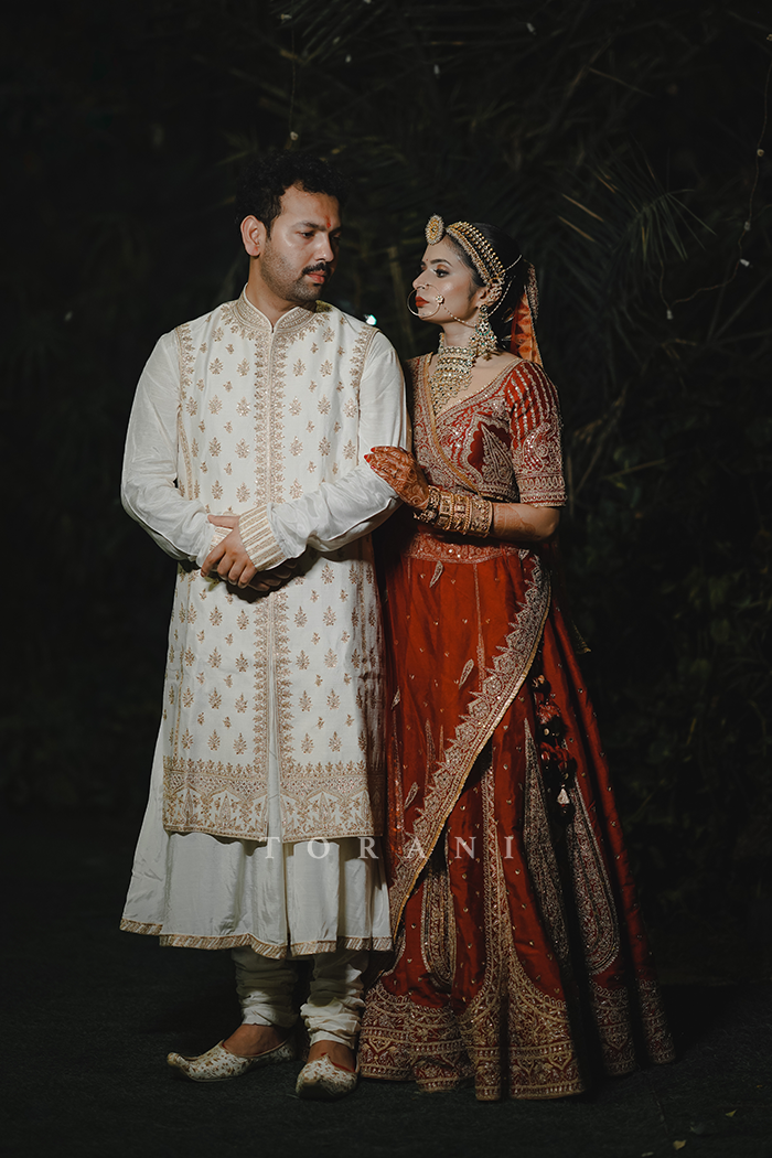 Sruthi with Her Partner in Our Custom Sindoori Suhani Lehenga Set &amp; Mogra Gaurish Sherwani Set