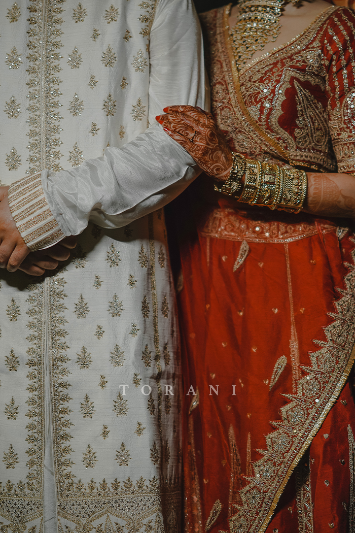 Sruthi with Her Partner in Our Custom Sindoori Suhani Lehenga Set &amp; Mogra Gaurish Sherwani Set