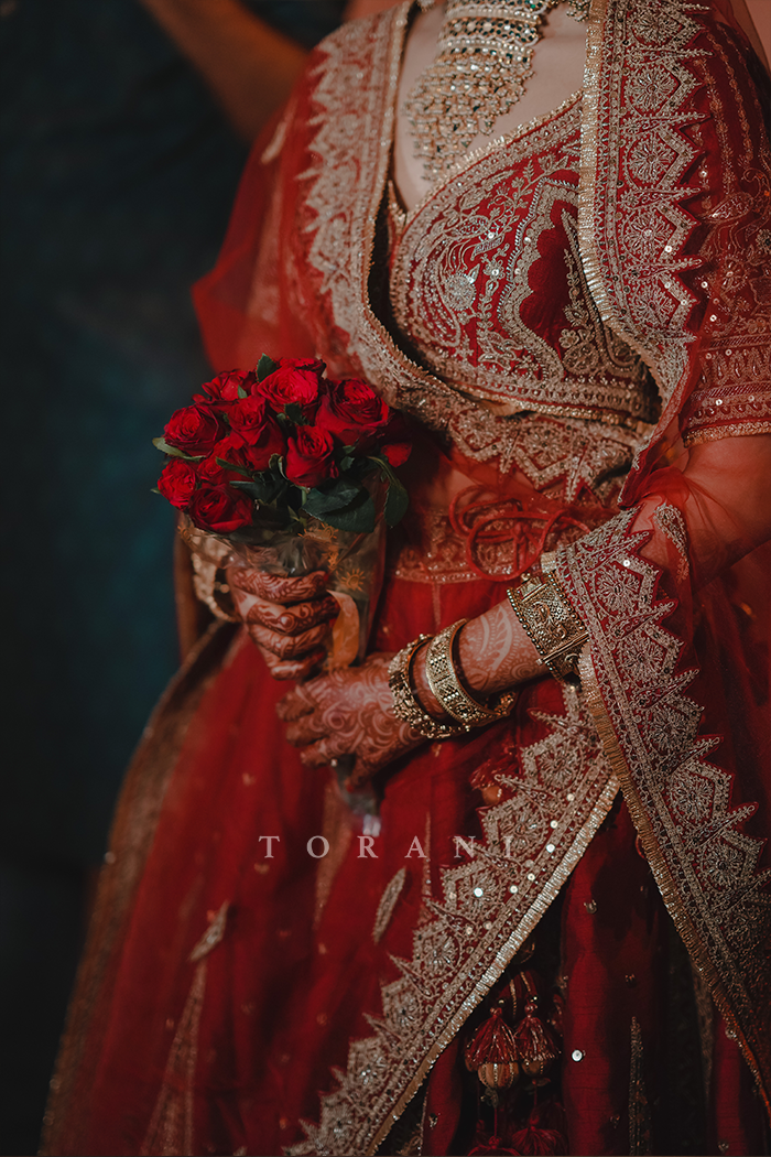 Sruthi with Her Partner in Our Custom Sindoori Suhani Lehenga Set &amp; Mogra Gaurish Sherwani Set