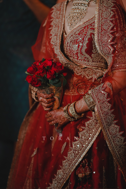 Sruthi with Her Partner in Our Custom Sindoori Suhani Lehenga Set &amp; Mogra Gaurish Sherwani Set