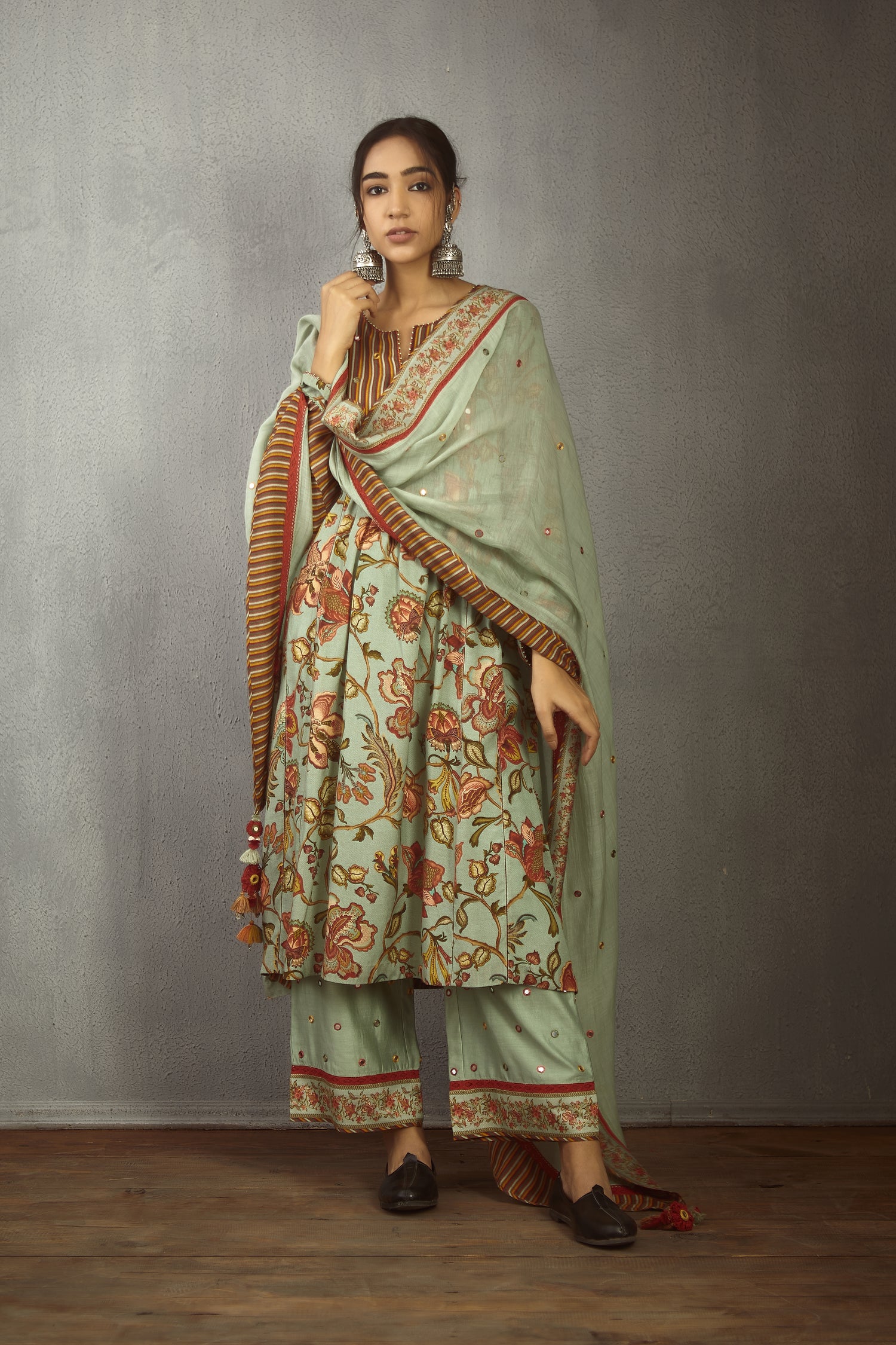 Harsukh in our Champa Sheesha Waraq Tara Kurta Set