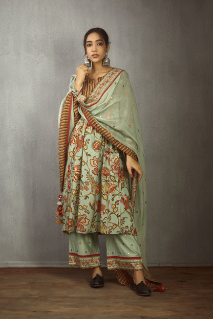 Harsukh in our Champa Sheesha Waraq Tara Kurta Set