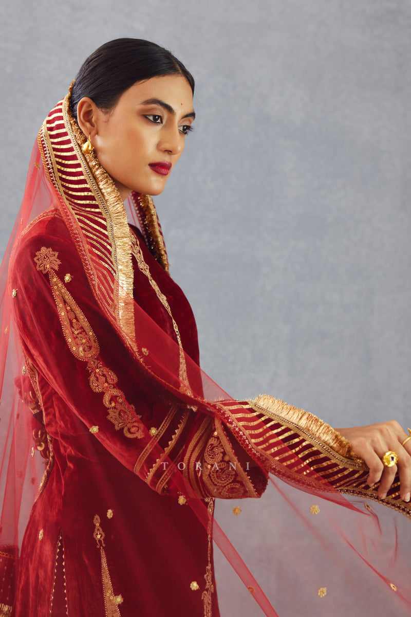 Red Kurta set in velvet with Gota embroidery on dupatta