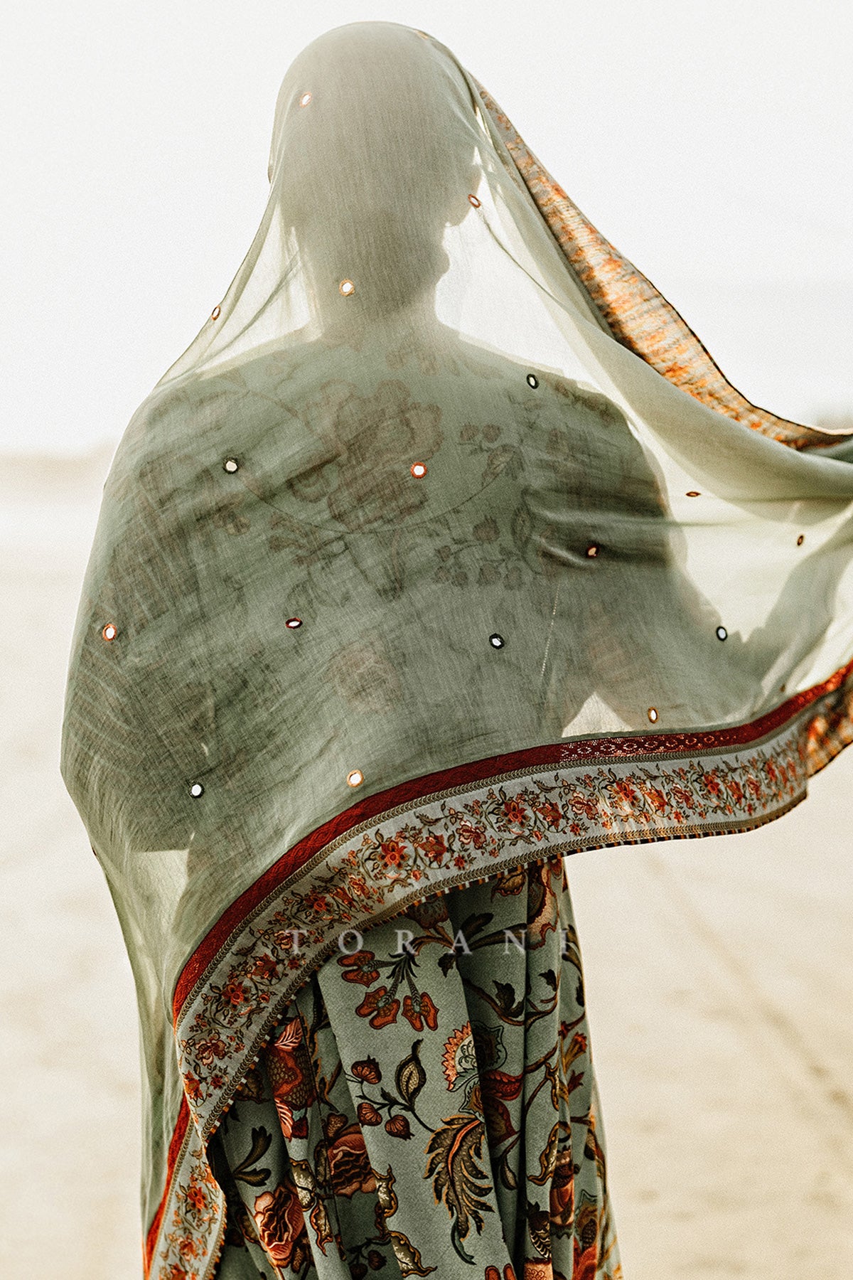 Harsukh in our Champa Sheesha Waraq Tara Kurta Set