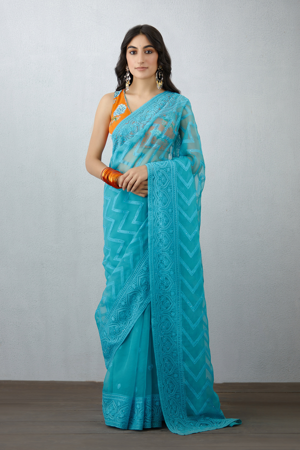 Blue organza saree with Machine Embroidery